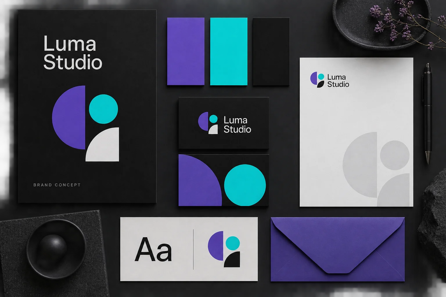 Fictional Luma Studio identity with purple, cyan and charcoal palette, type sample and stationery.